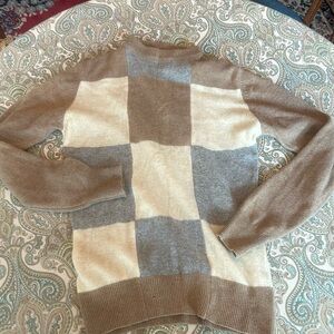 100% 2-Ply Scottish cashmere sweater.